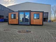 Online auction Woonunits, stellingen, opslagtenten, wandecoratie en machines